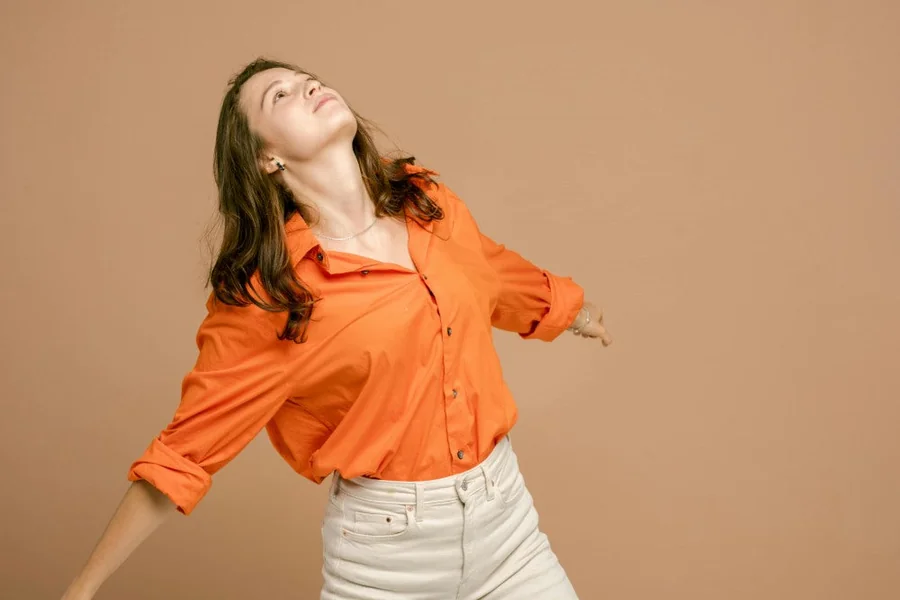 something in the orange shirt